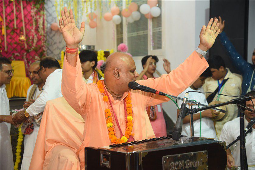 Beautiful altar of Lord Krishna with fresh flowers and decorations
